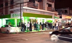 Registro da inauguraÃ§Ã£o da 15Âª agÃªncia da cooperativa na regiÃ£o localizada no bairro Oficinas em TubarÃ£o. Por Cleber Bonotto
