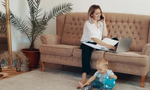 beautiful business woman working home multi tasking freelance motherhood concept 158595 5064