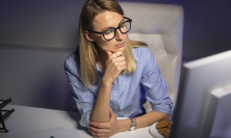medium shot woman working late night