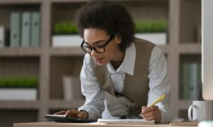 medium shot woman working as economist